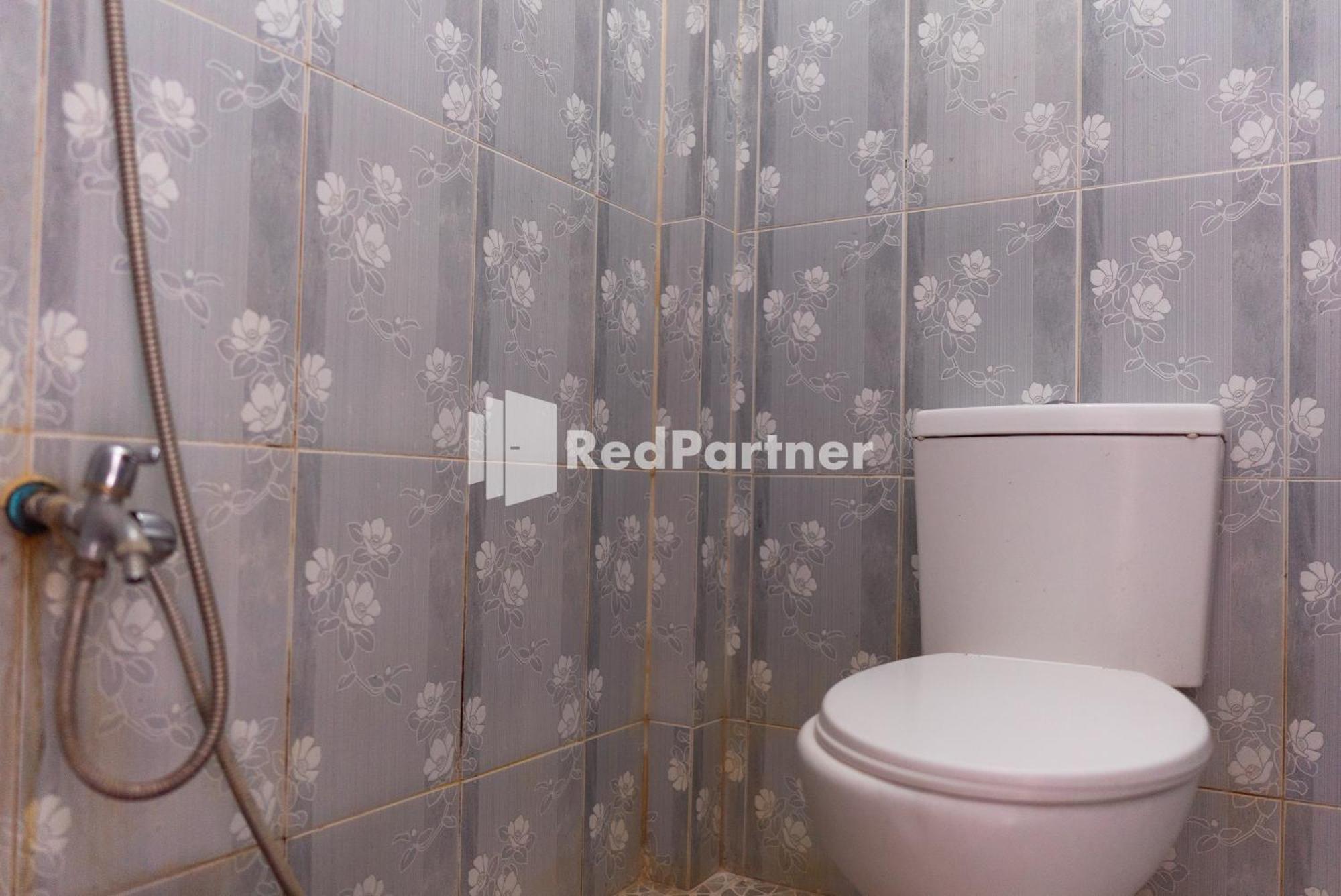 Pondok Kelapa Homestay Lampung Mitra Reddoorz Bandar Lampung Habitación foto